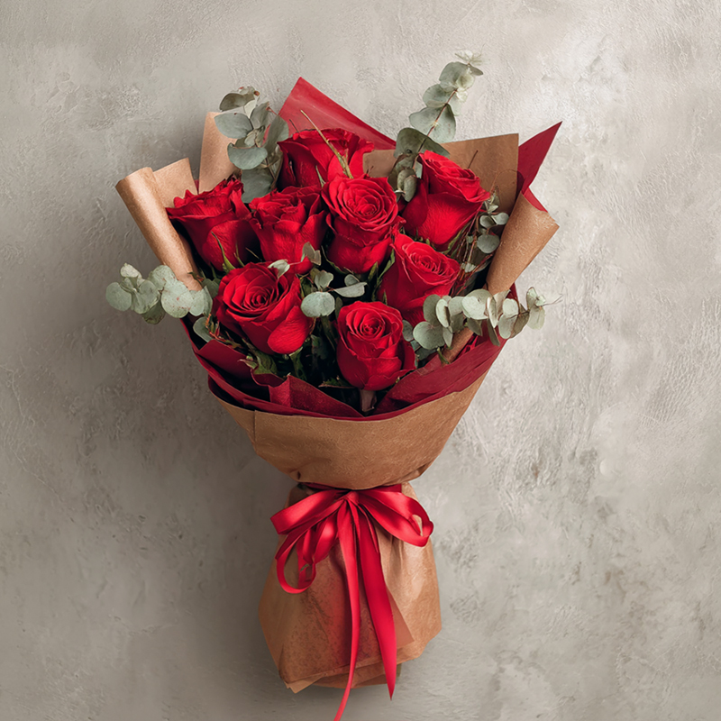 What should be written on the flower basket sent for the opening of Sandakan Bank